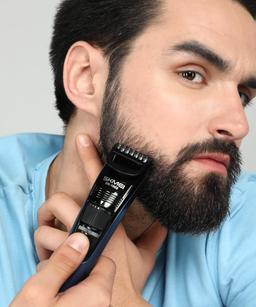 Skmei Beard trimmer Hair Clipper (Corded) with 13 Length Settings,41 mm Wide Cutter, Stainless Steel Blades and Trim-n-Flow Technology for Men (SK-1002)